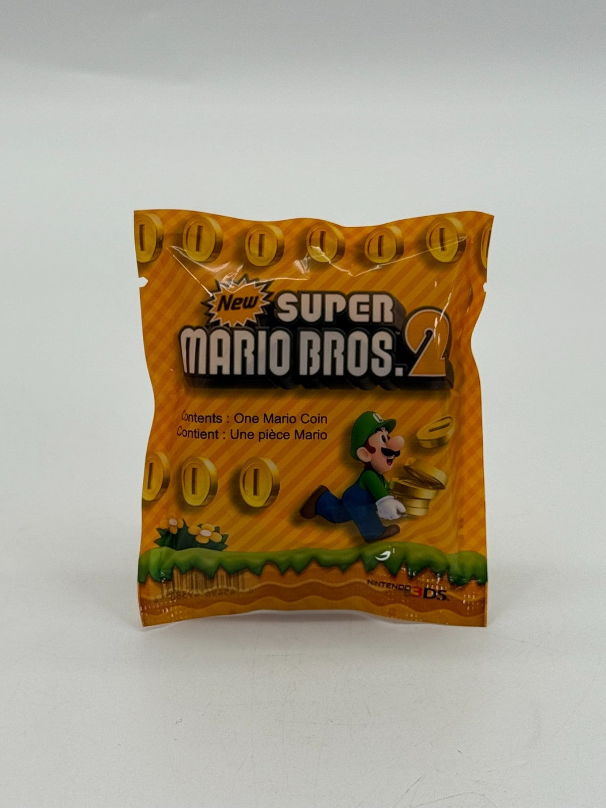 New Super Mario Bros 2 Pre-Order Promo Golden Coin Neu Sealed
