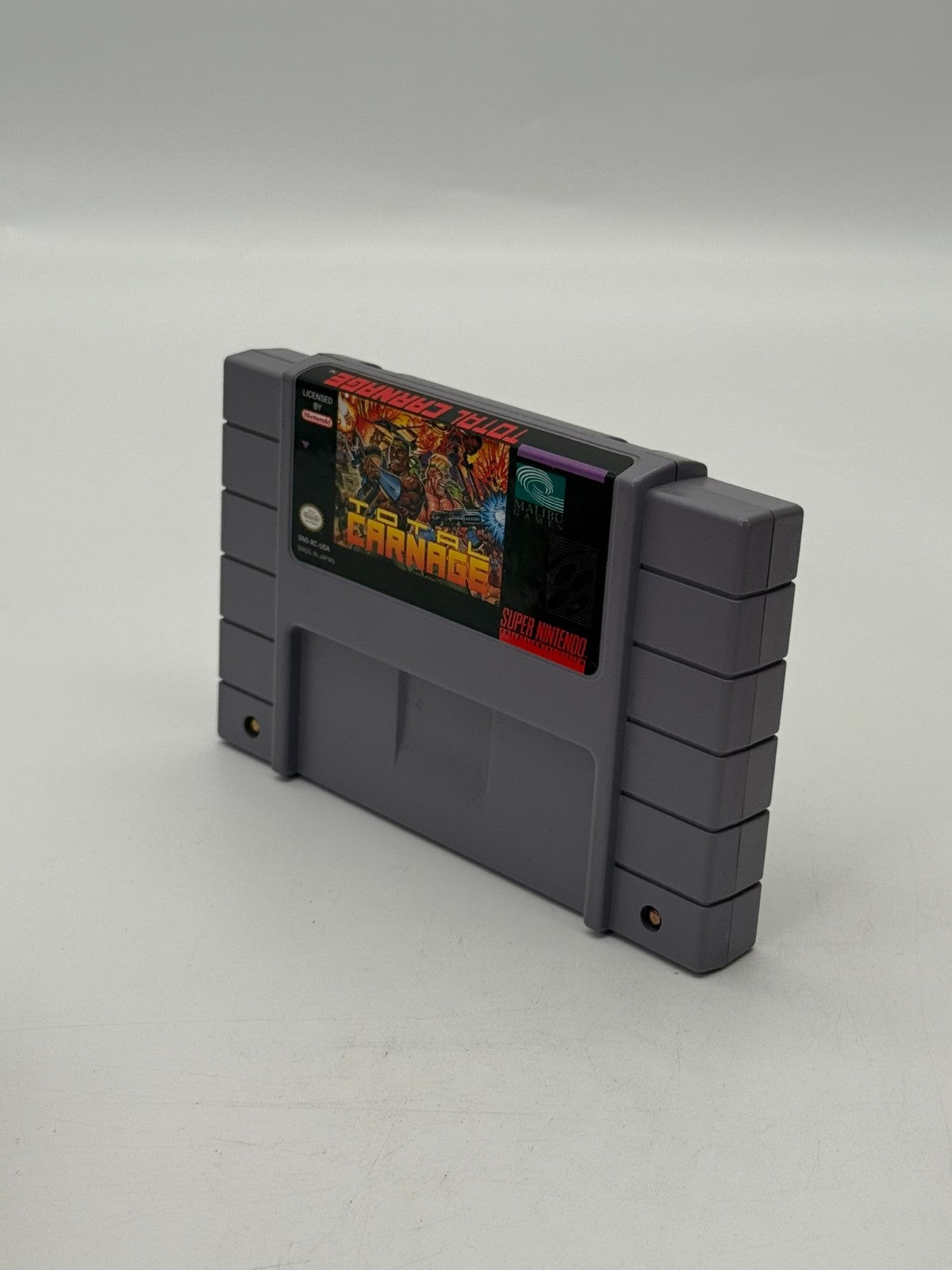 Total Carnage Super Nintendo SNES NTSC-U/C bon - Très bon notice + cartouche