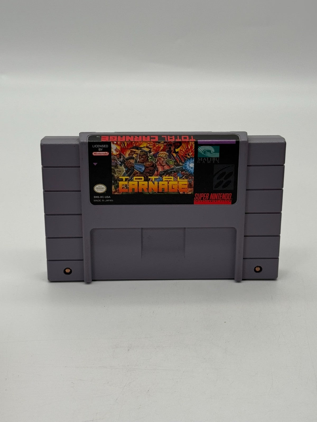 Total Carnage Super Nintendo SNES NTSC-U/C bon - Très bon notice + cartouche