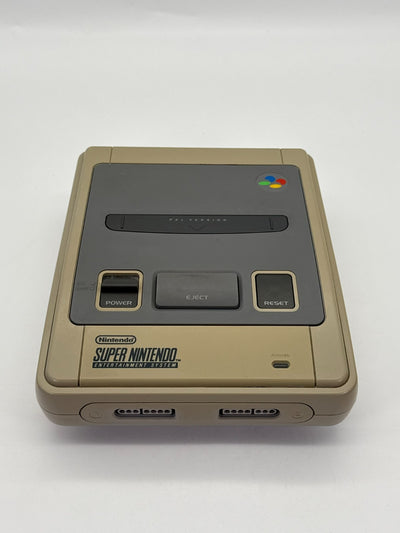 Console Nintendo SNES incluant 1 manette, bon état, jaunie