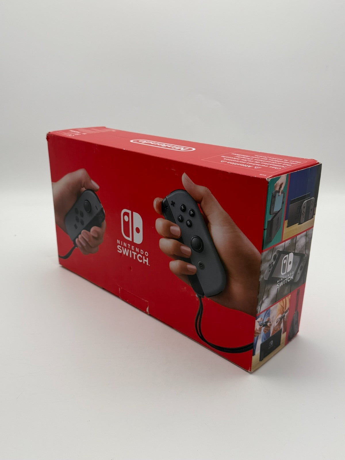 Nintendo Switch V2 Konsole Grau guter Zustand mit Originalverpackung hintere Halterung fehlt