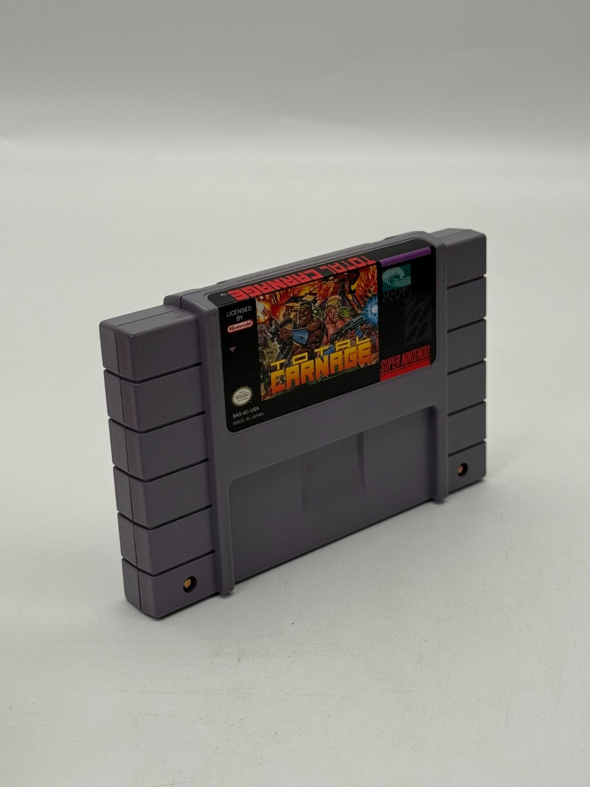 Total Carnage Super Nintendo SNES NTSC-U/C bon - Très bon notice + cartouche