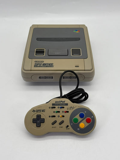 Console Nintendo SNES incluant 1 manette, bon état, jaunie