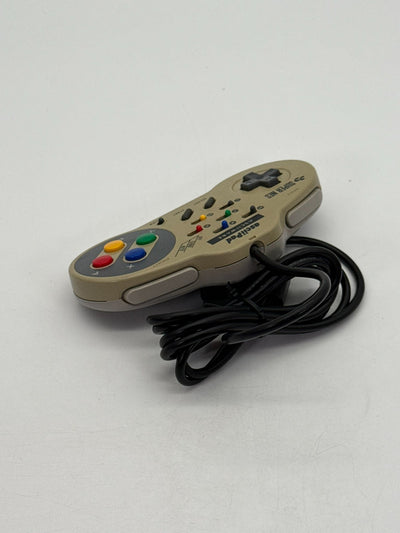 Console Nintendo SNES incluant 1 manette, bon état, jaunie