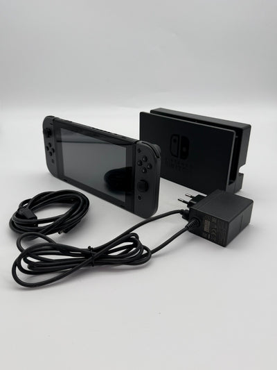 Nintendo Switch V2 Konsole Grau guter Zustand mit Originalverpackung hintere Halterung fehlt