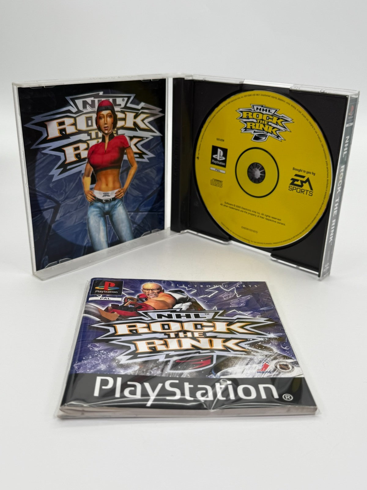 NHL Rock The Rink Sony Playstation 1 bon état complet en boîte