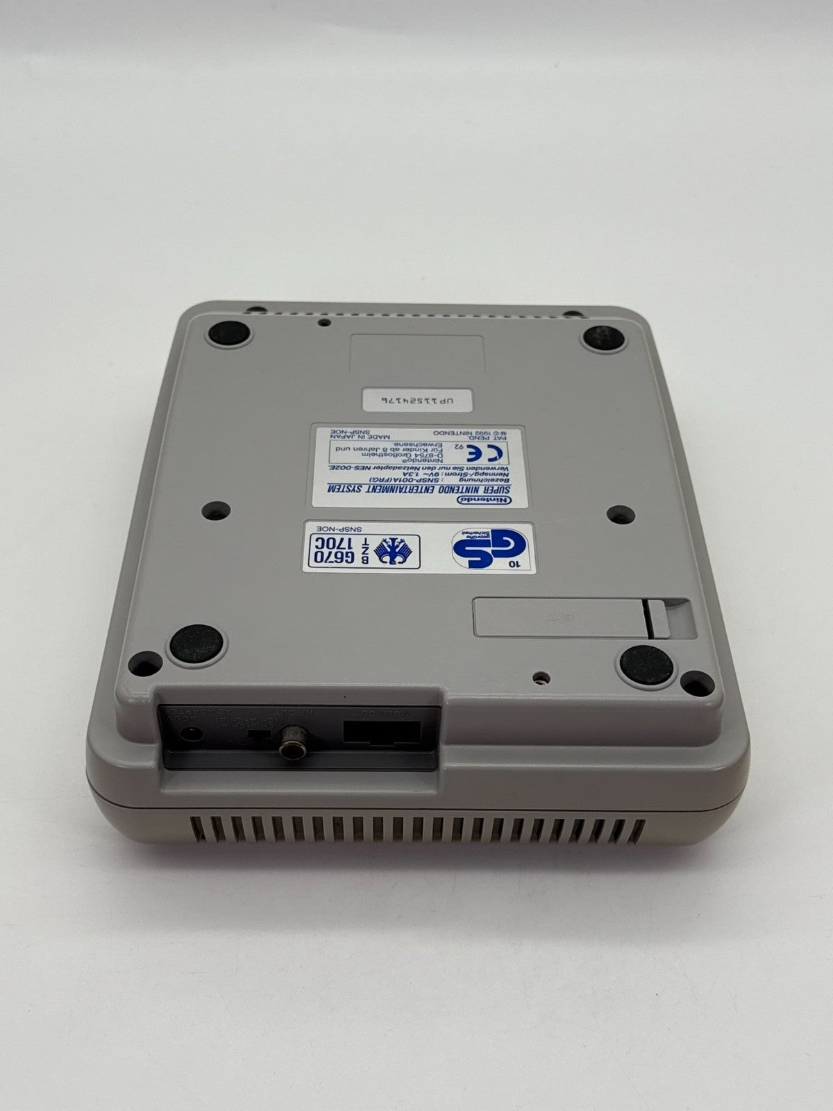 Console Nintendo SNES incluant 1 manette, bon état, jaunie