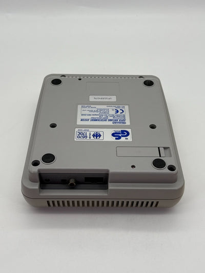 Console Nintendo SNES incluant 1 manette, bon état, jaunie