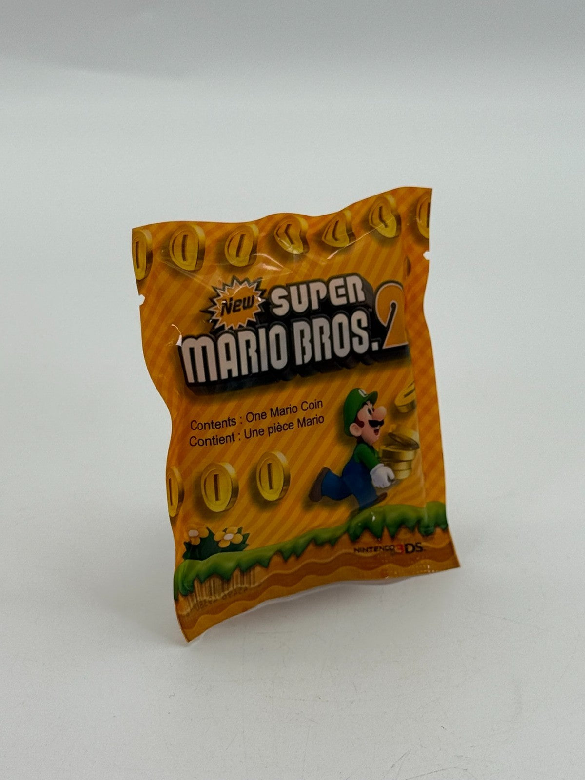 New Super Mario Bros 2 Pre-Order Promo Golden Coin Neu Sealed