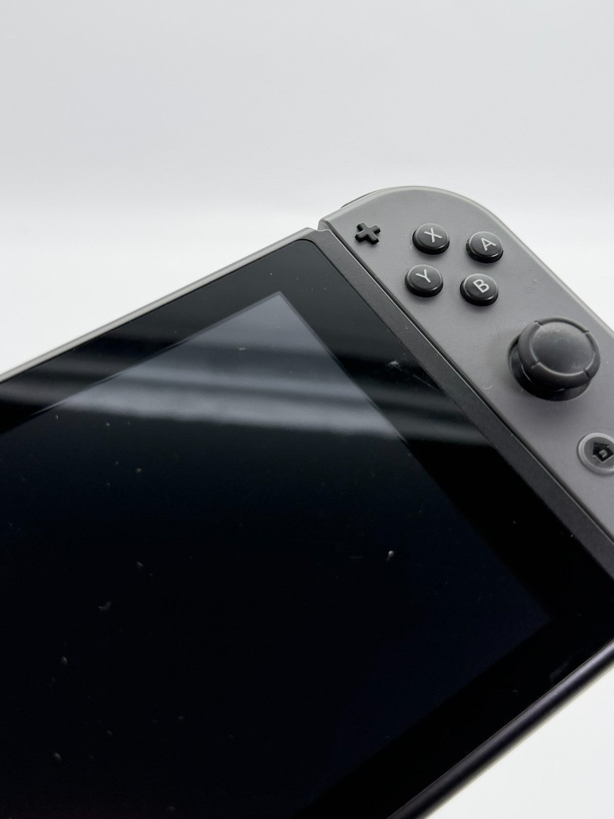 Nintendo Switch V2 Konsole Grau guter Zustand mit Originalverpackung hintere Halterung fehlt